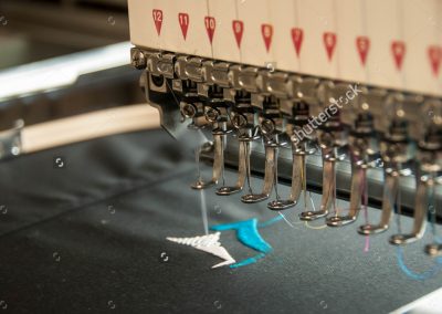 stock-photo-embroidery-machine-stitching-a-logo-516185119